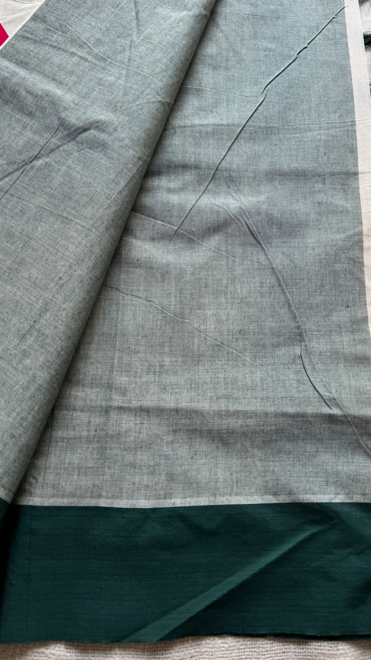 Ivory Kerala cotton saree with green Kutch-inspired printed borders and green centre pleats - YCIEKCFE314