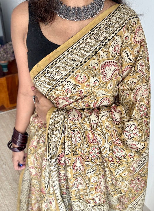 Ginger yellow kalamkari, pink floral vines, floral motif pallu