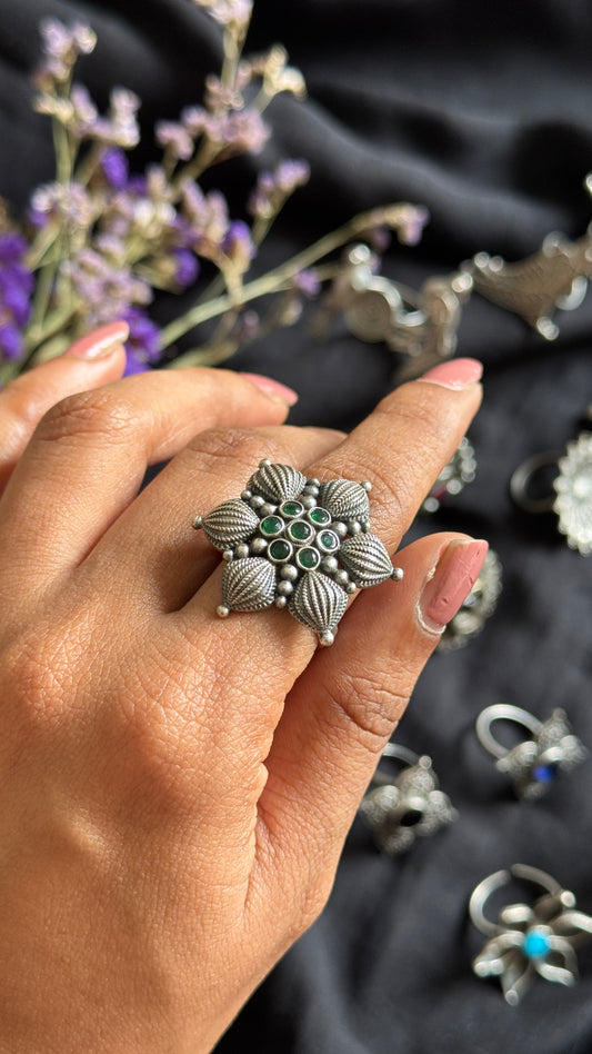 Adjustable floral petal ring - green stones