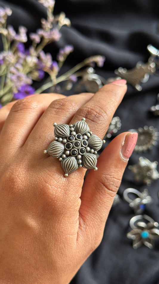 Adjustable floral petal ring - black stones