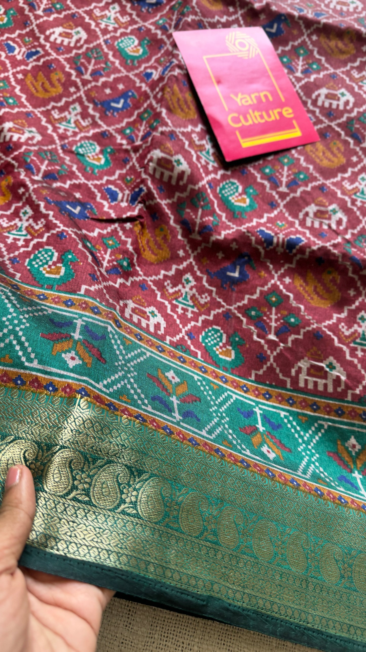 Maroon with green in patola pattern - dola silk