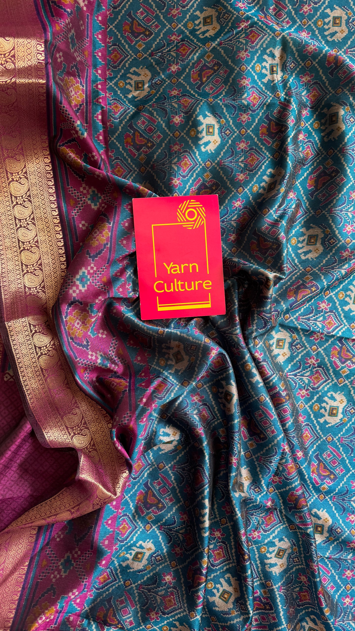 Peacock blue with wine in patola pattern - dola silk