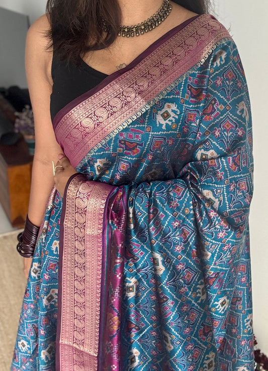 Peacock blue with wine in patola pattern - dola silk