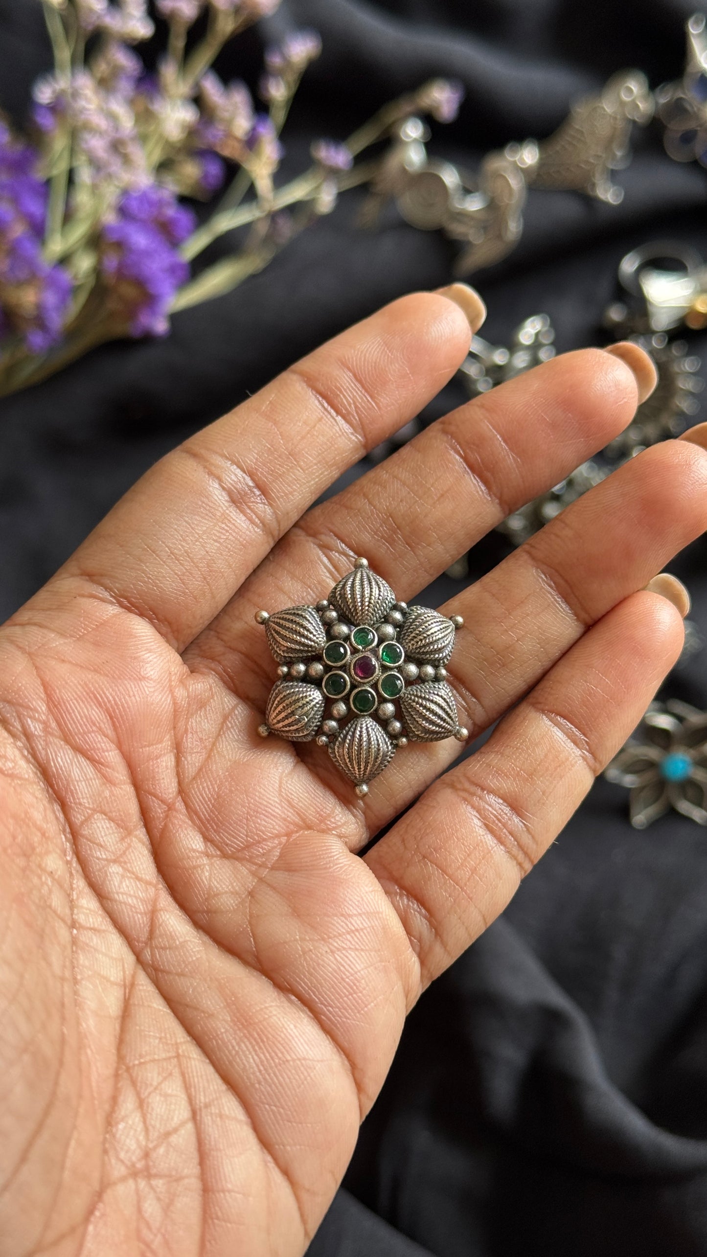 Adjustable floral petal ring - green red stones