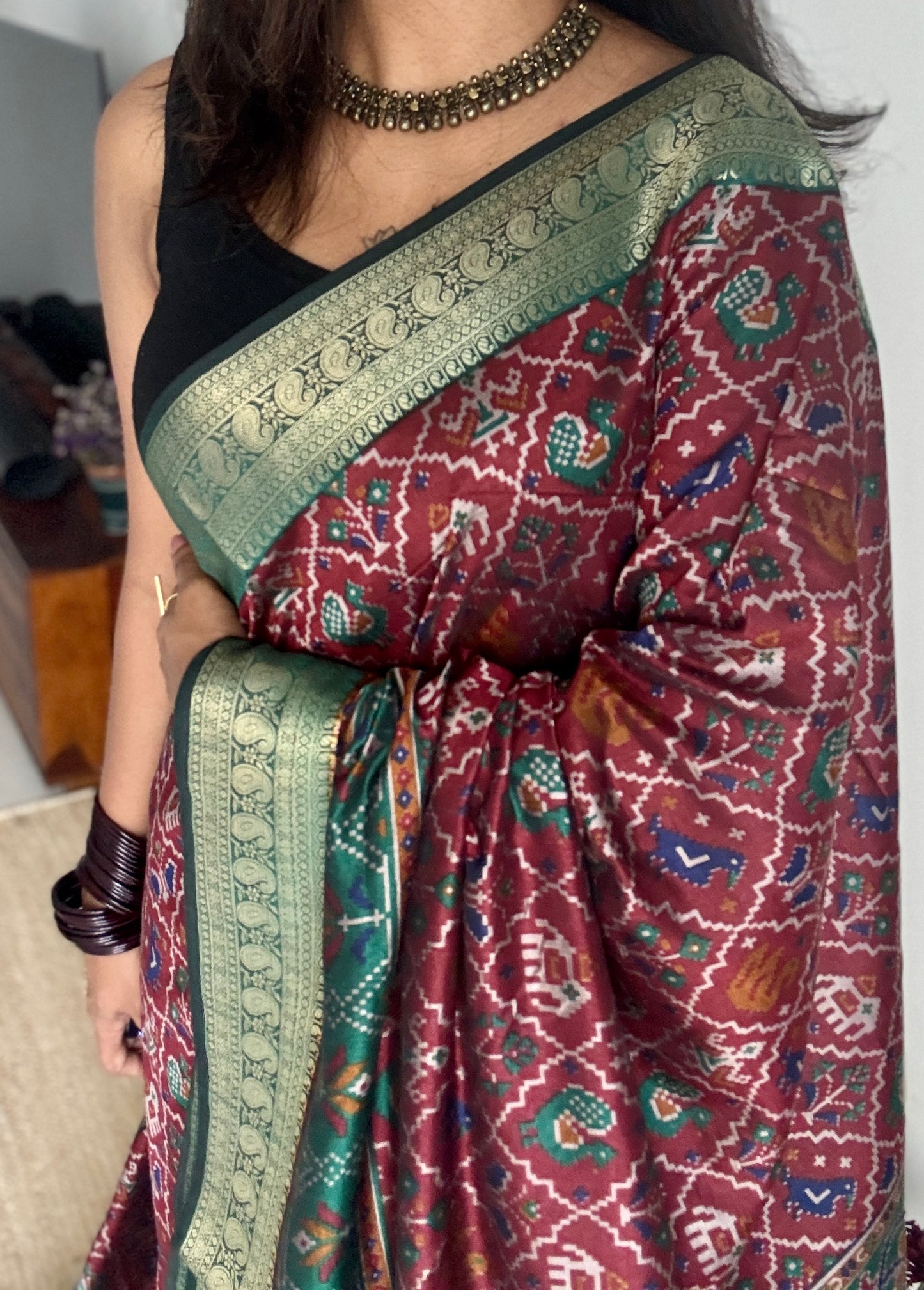 Maroon with green in patola pattern - dola silk