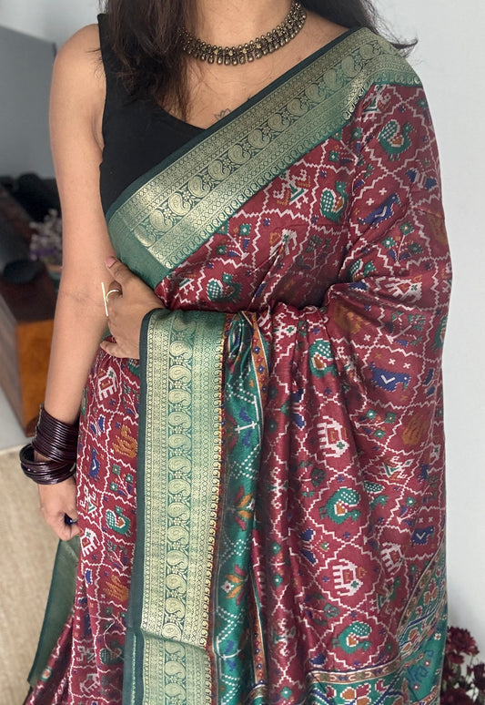 Maroon with green in patola pattern - dola silk