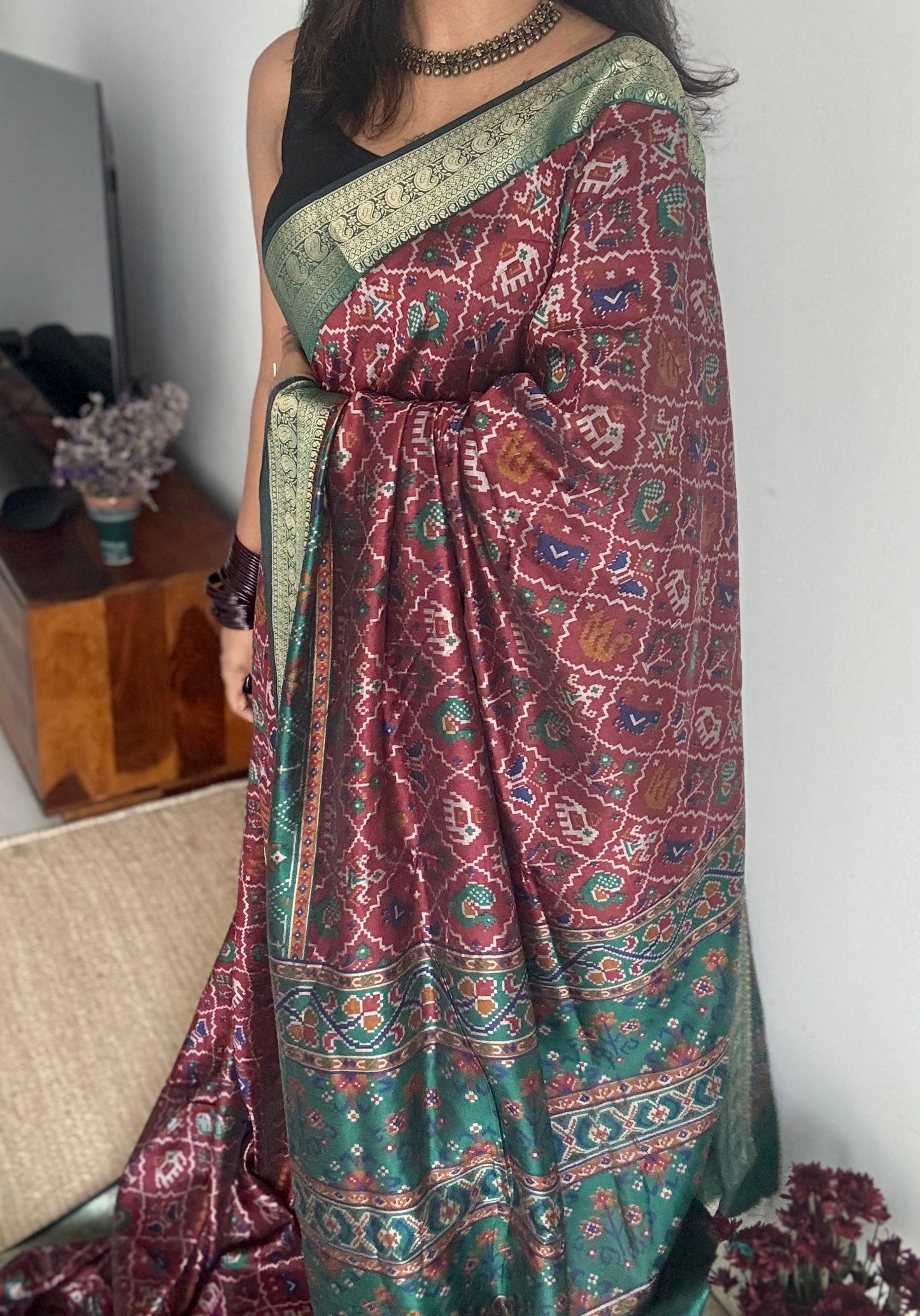 Maroon with green in patola pattern - dola silk