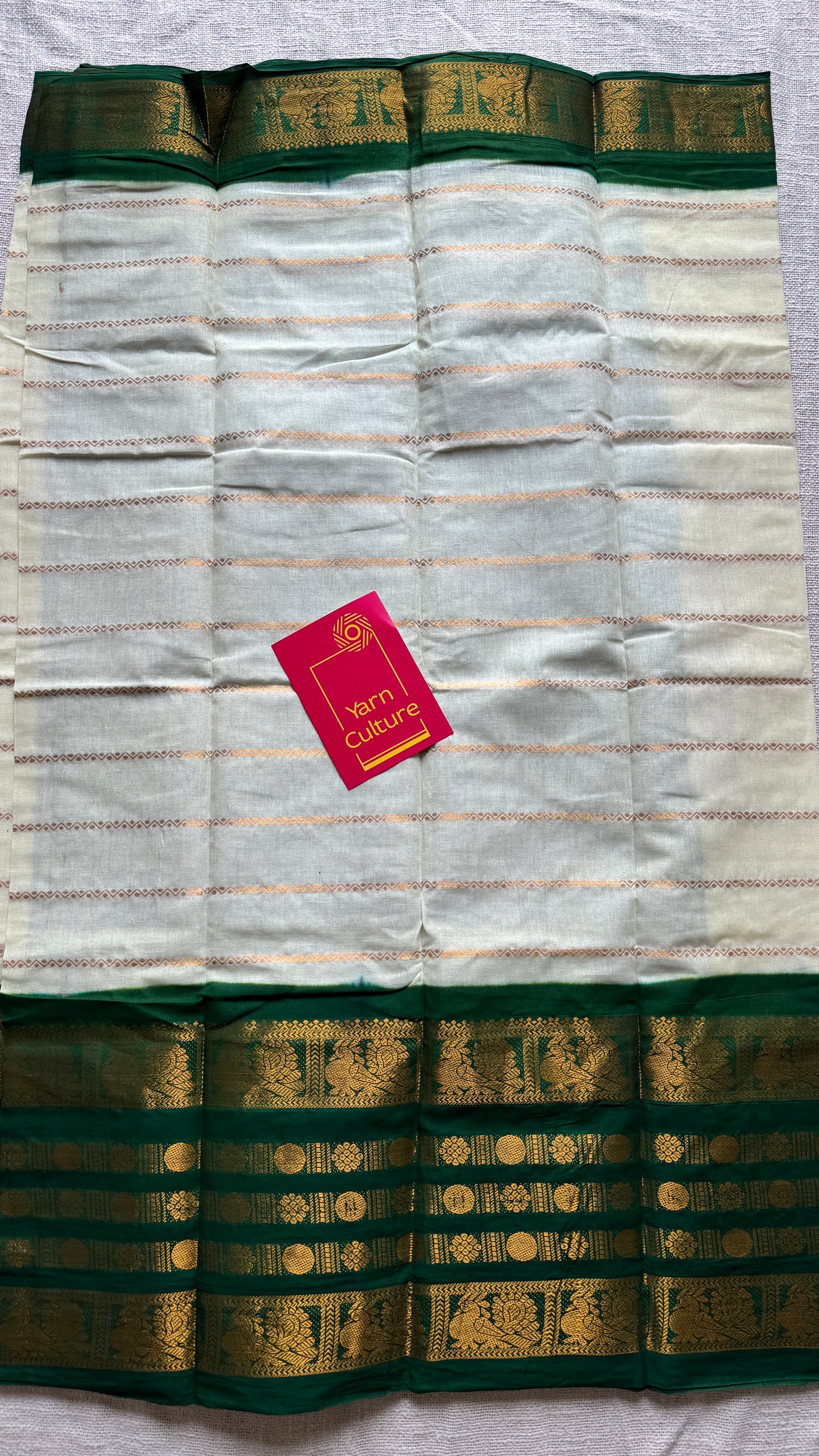 Offwhite and green sungudi with peacock motif rettai pettu wide border