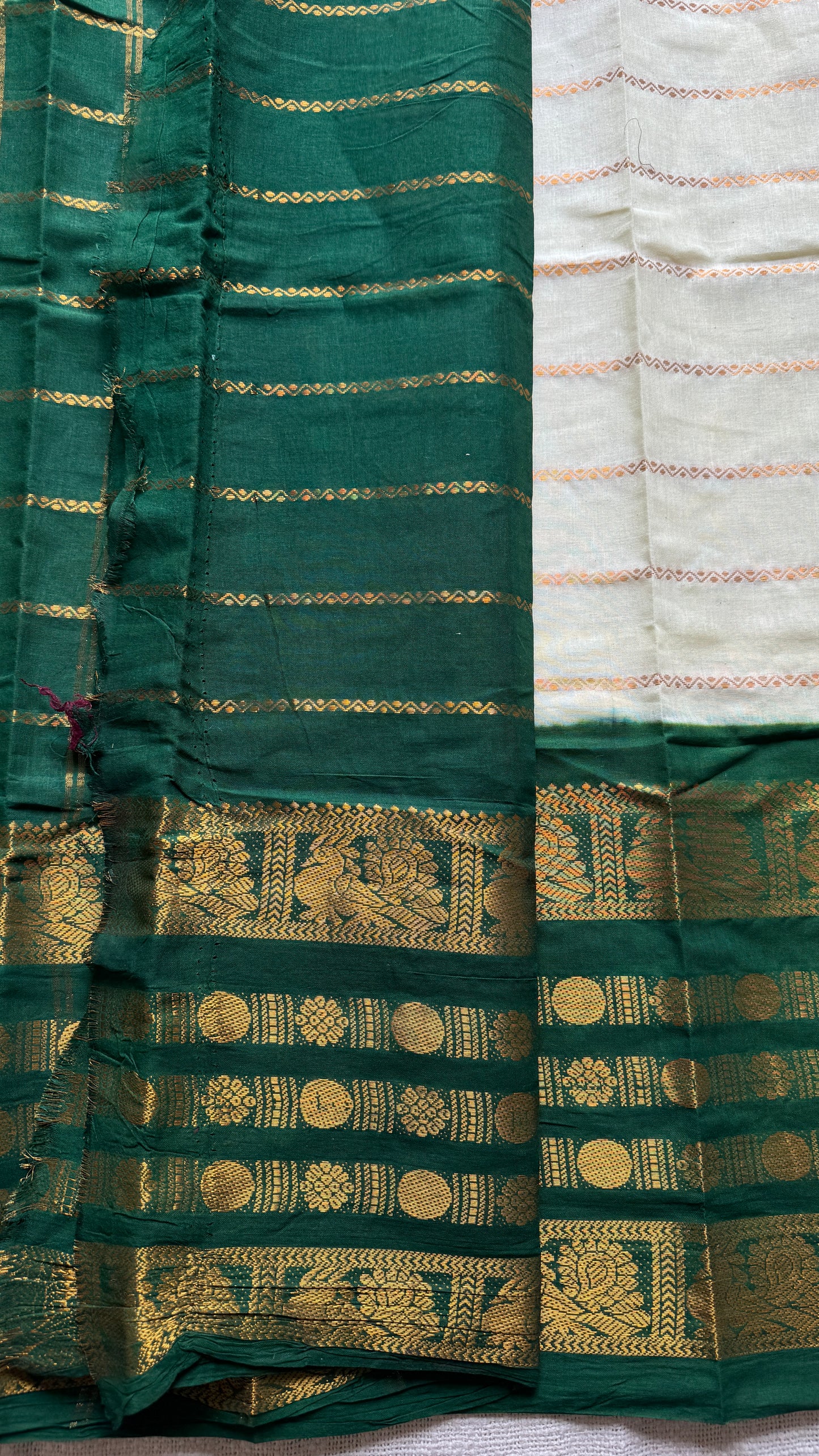 Offwhite and green sungudi with peacock motif rettai pettu wide border