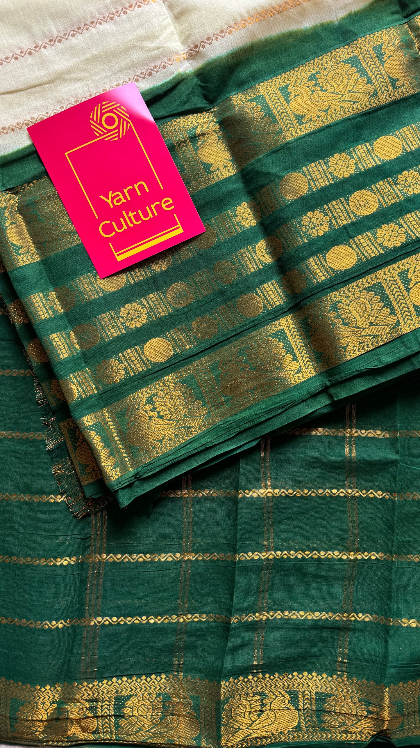 Offwhite and green sungudi with peacock motif rettai pettu wide border