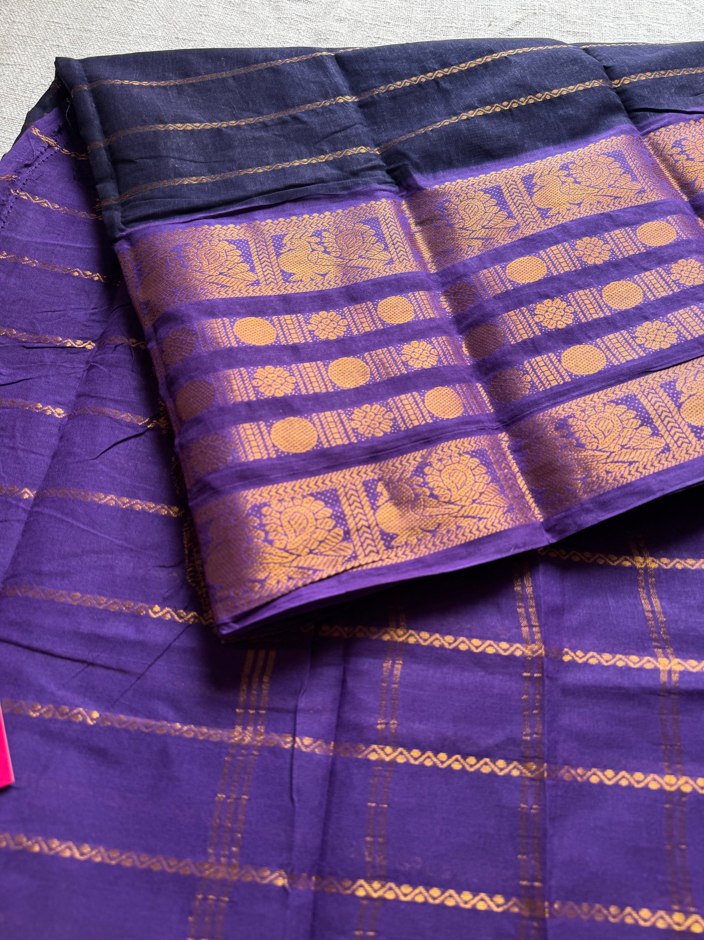 Black and violet sungudi with peacock motif rettai pettu wide border