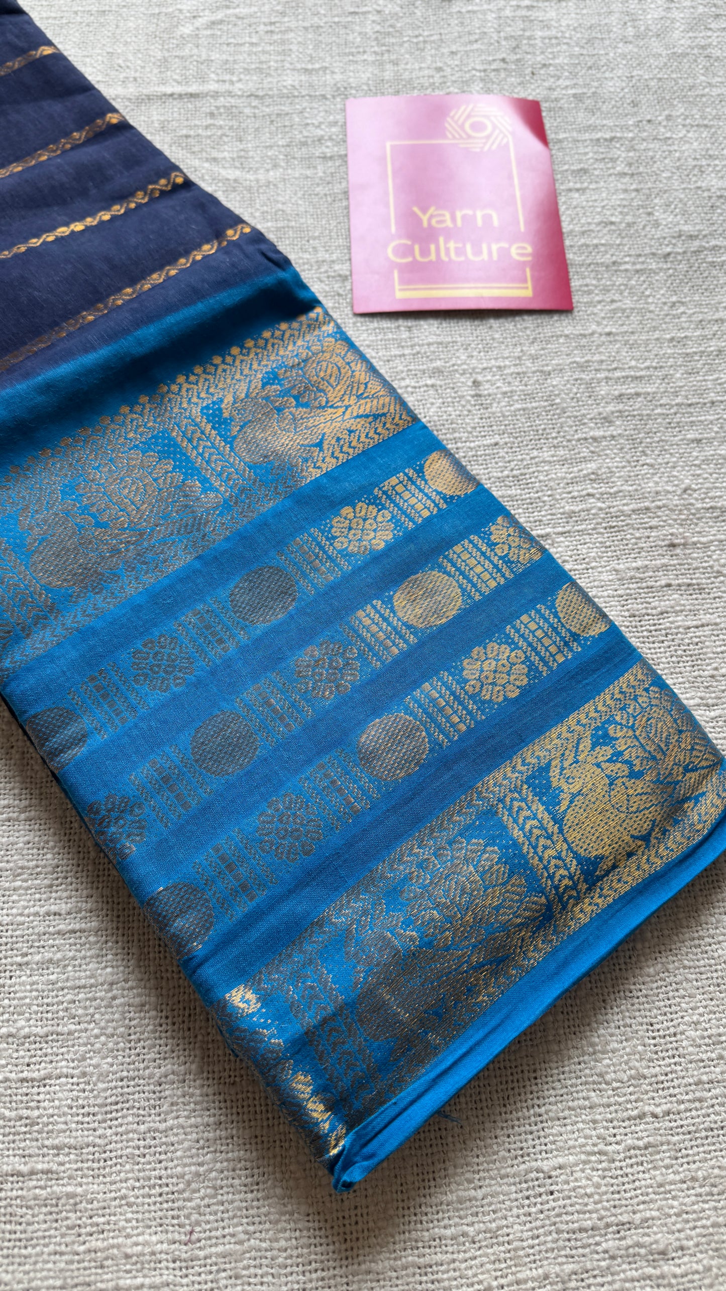 Dark blue and light blue sungudi with peacock motif rettai pettu wide border