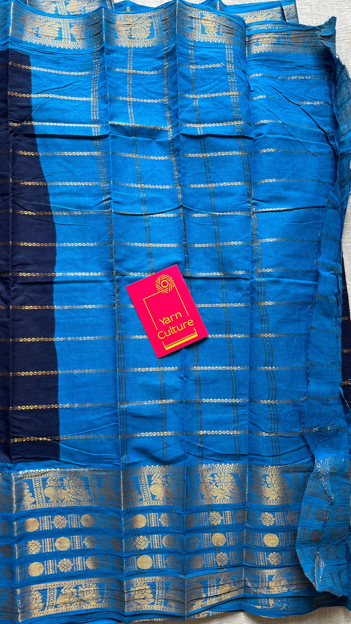 Dark blue and light blue sungudi with peacock motif rettai pettu wide border