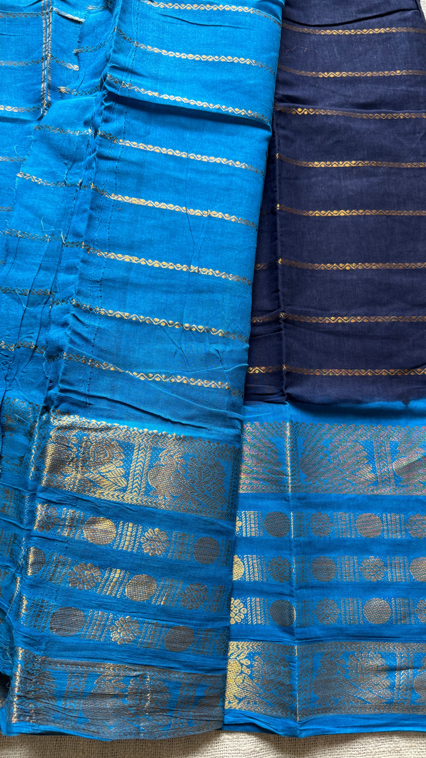 Dark blue and light blue sungudi with peacock motif rettai pettu wide border