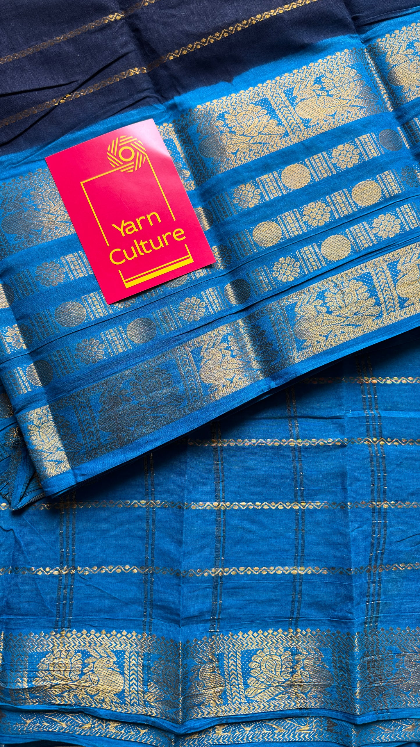 Dark blue and light blue sungudi with peacock motif rettai pettu wide border