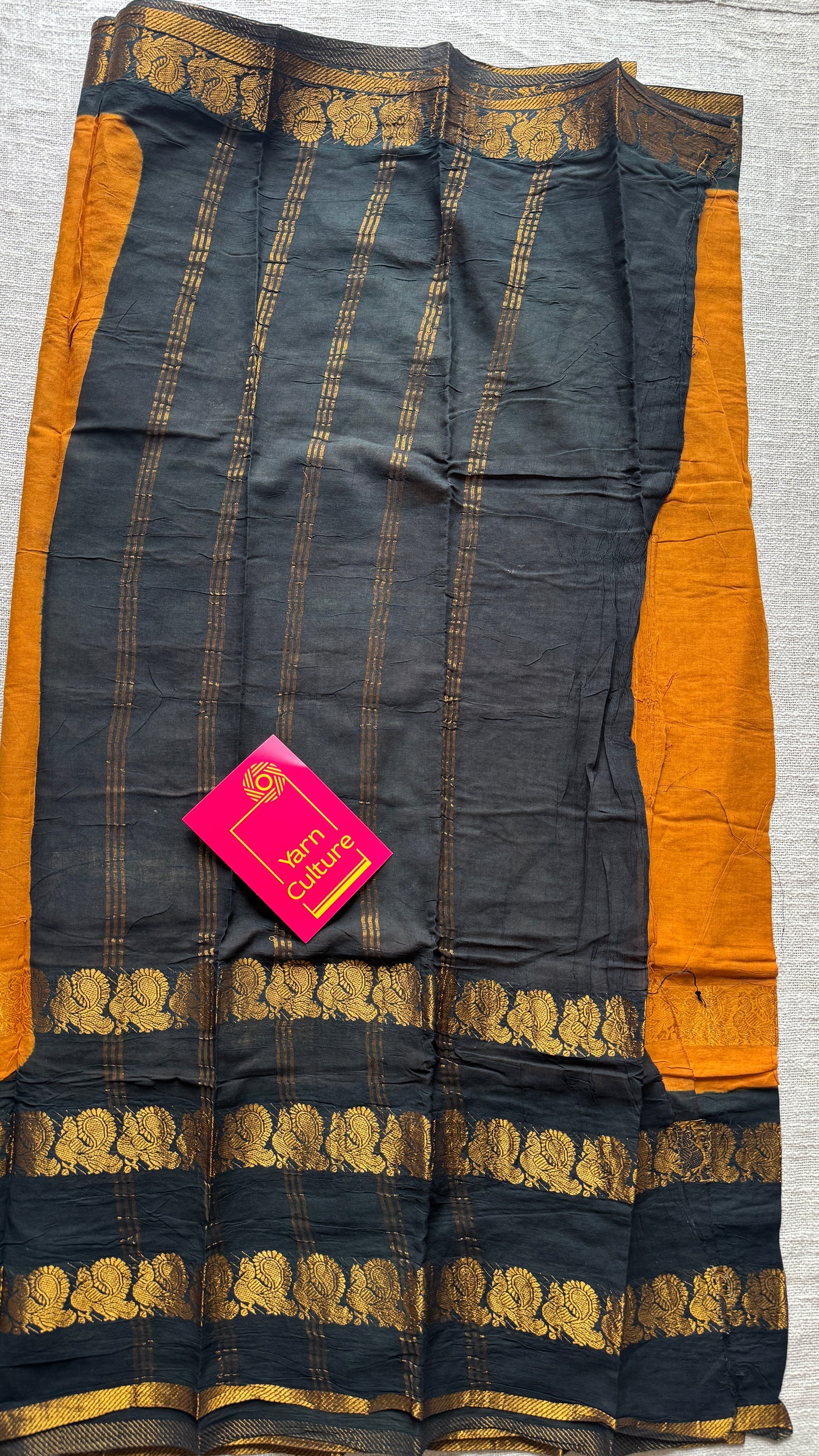 Dark Yellow and black sungudi with double peacock motif rettai pettu wide border
