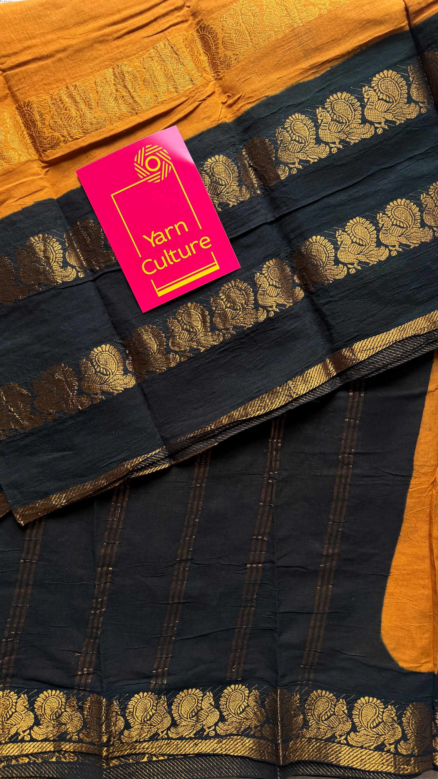 Dark Yellow and black sungudi with double peacock motif rettai pettu wide border