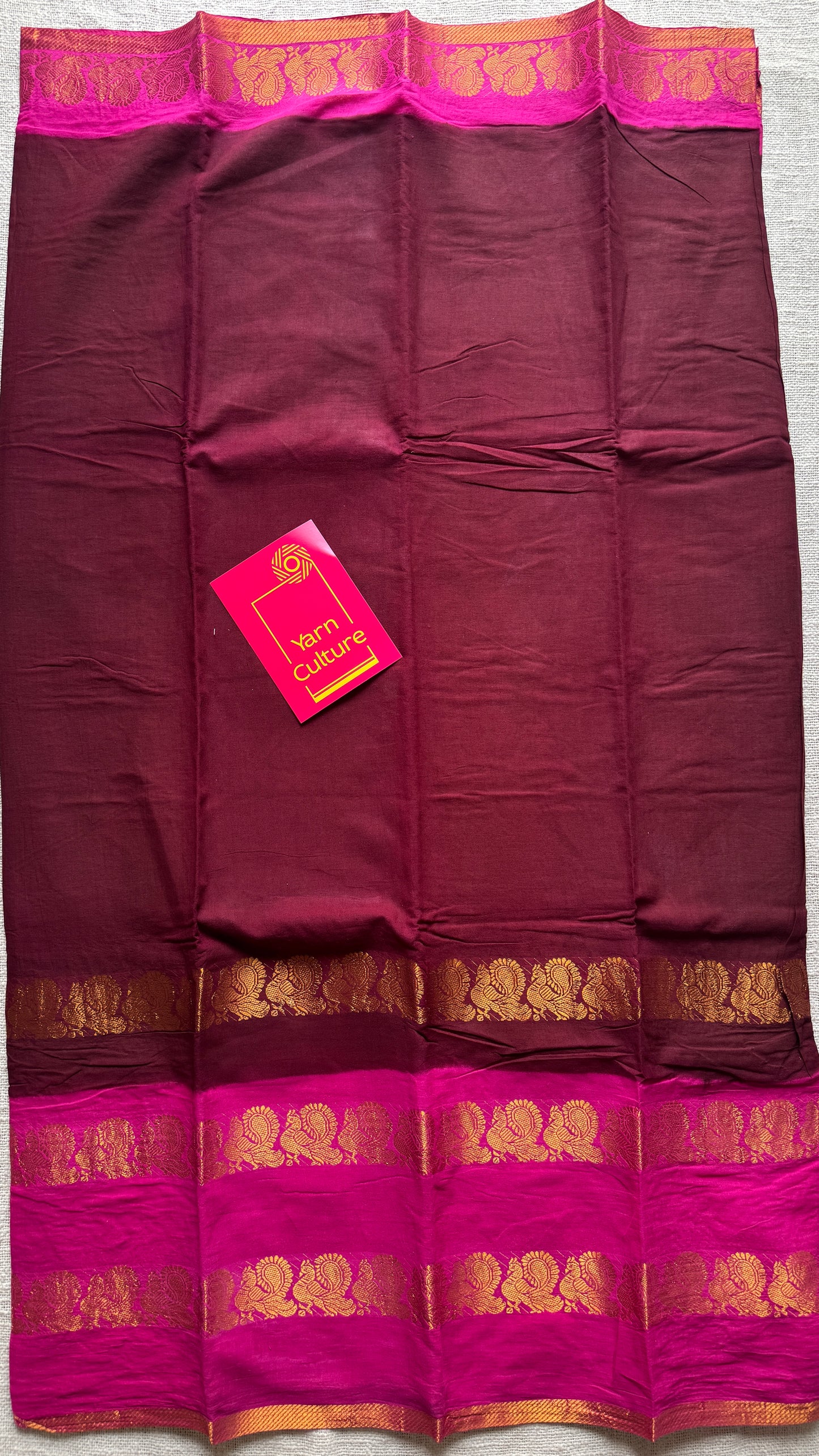Maroon and pink sungudi with double peacock motif rettai pettu wide border