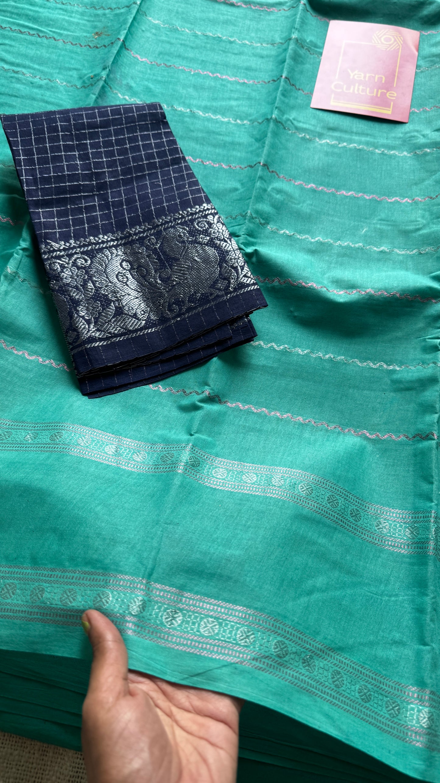 Turquoise veldhaari and patterned silver zari sungudi
