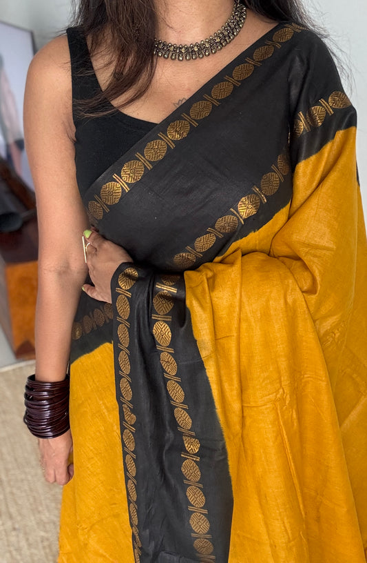 Dark yellow with black rudraksham motif border