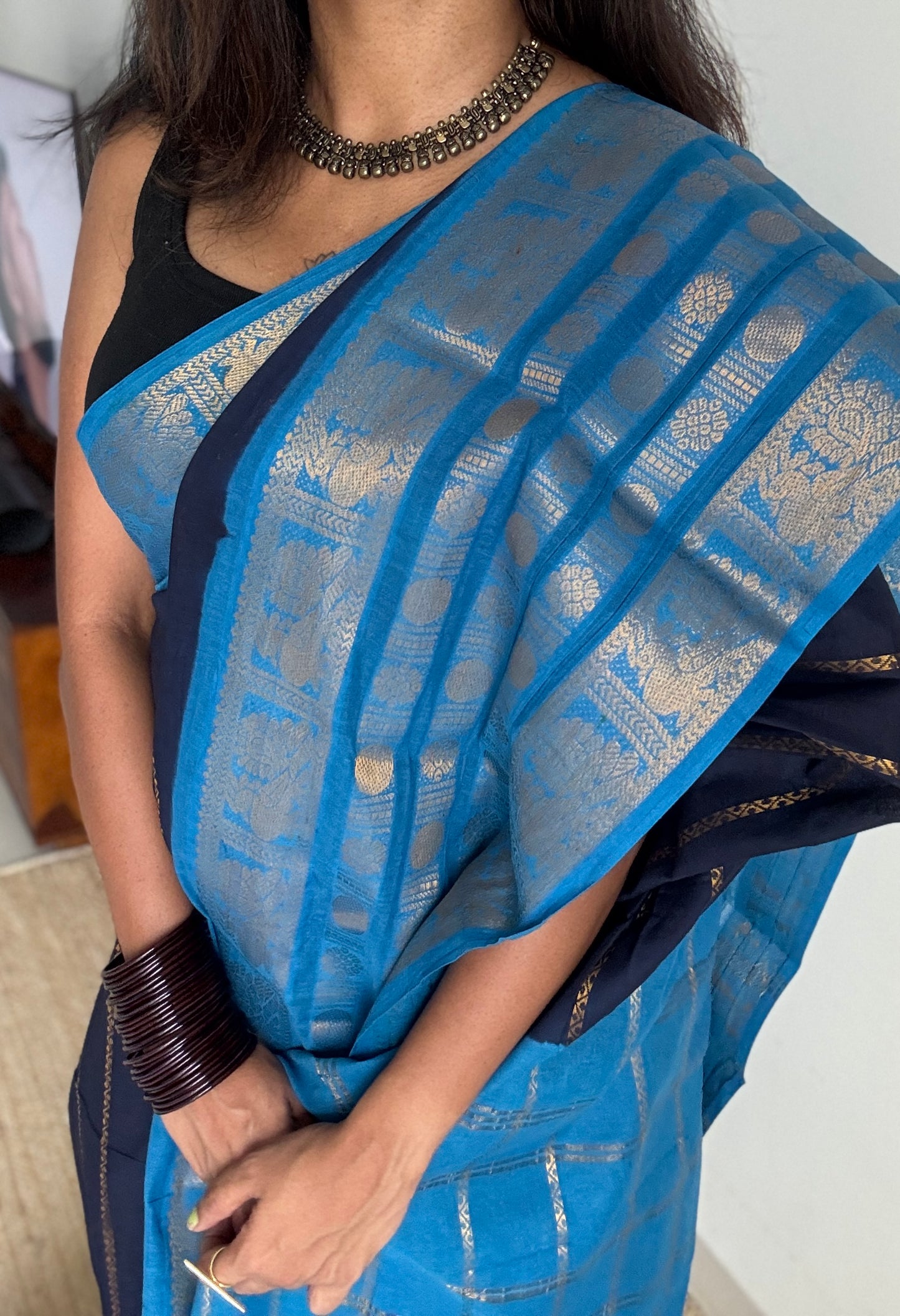 Dark blue and light blue sungudi with peacock motif rettai pettu wide border