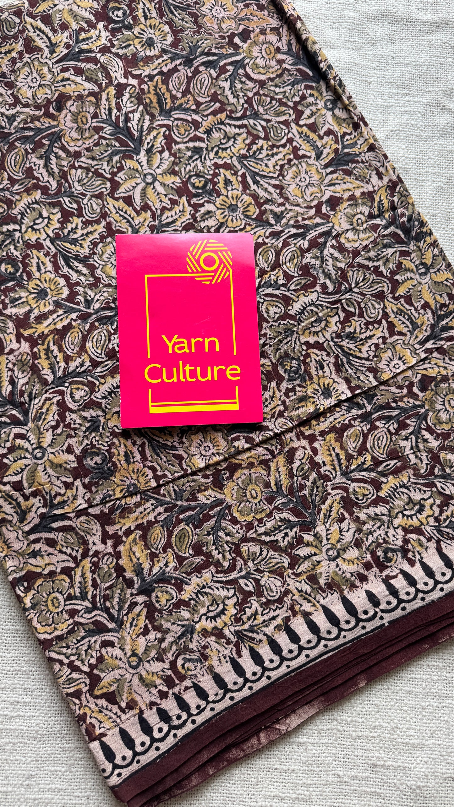 Maroon kalamkari, floral vines, floral motif pallu
