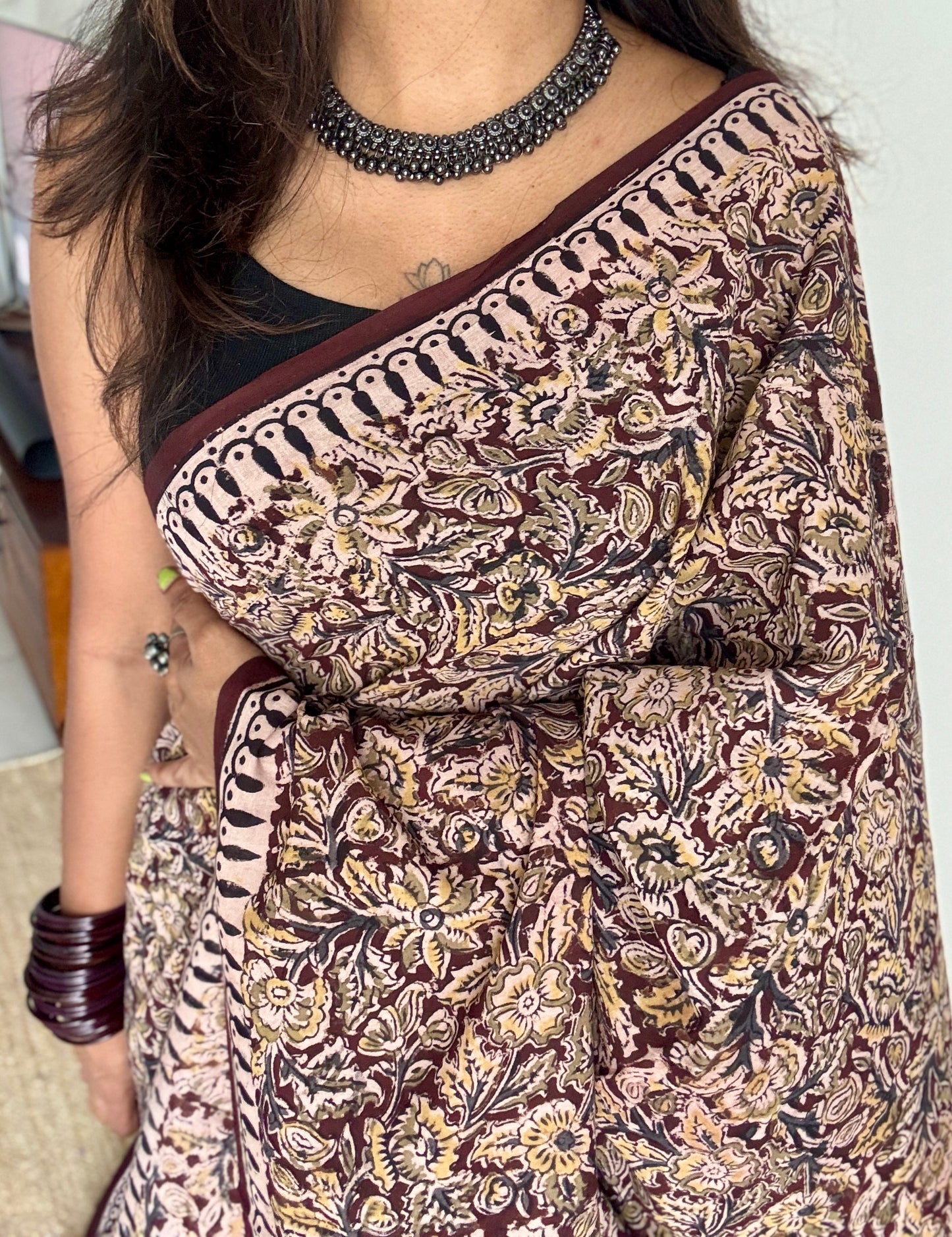 Maroon kalamkari, floral vines, floral motif pallu