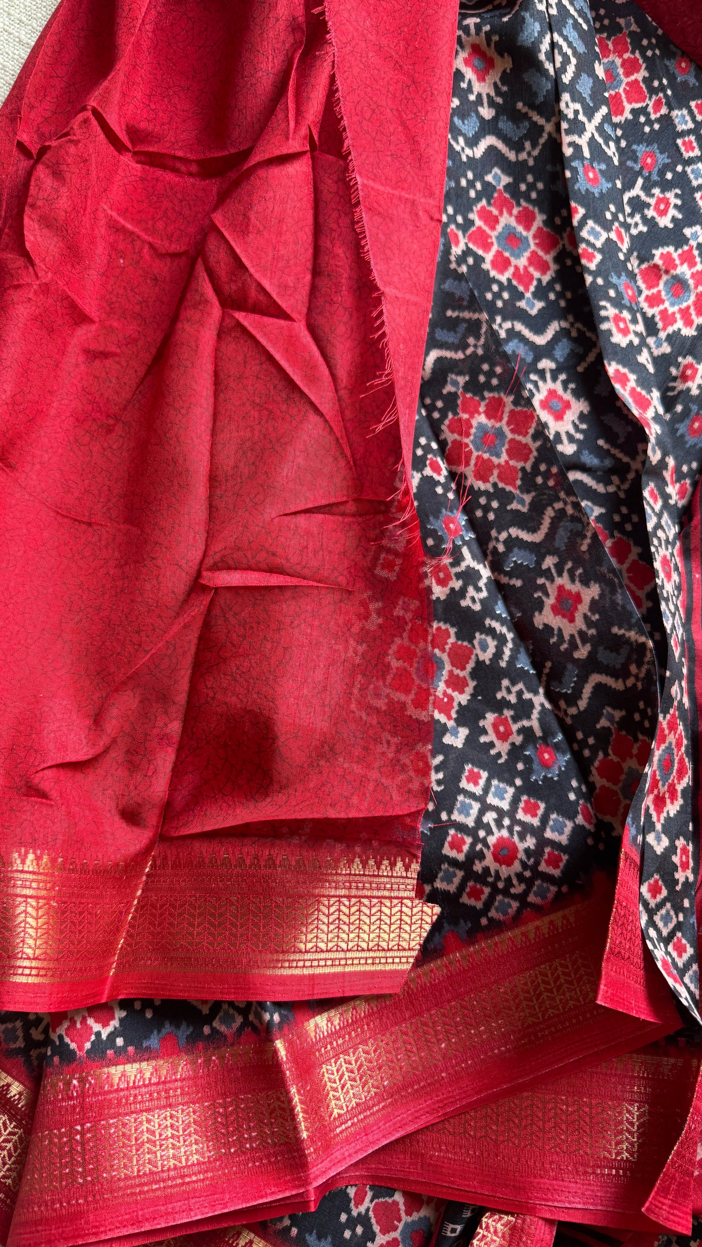 Black red dola semi silk with patola pattern