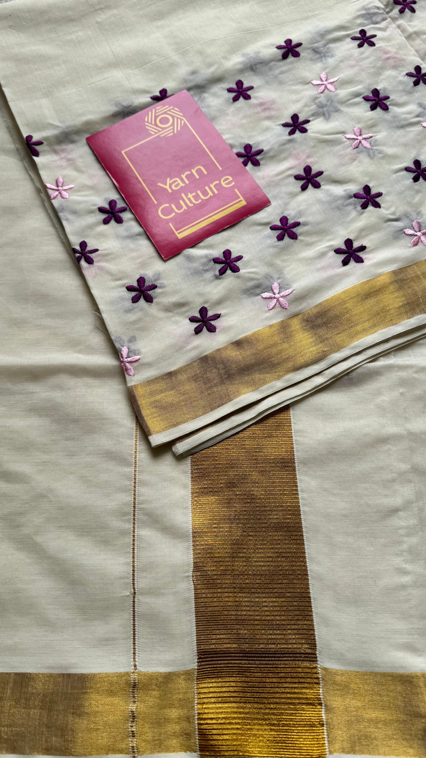Anjana : Delicate purple and light pink flowers embroidered in soft Kerala cotton - YCONKCE156