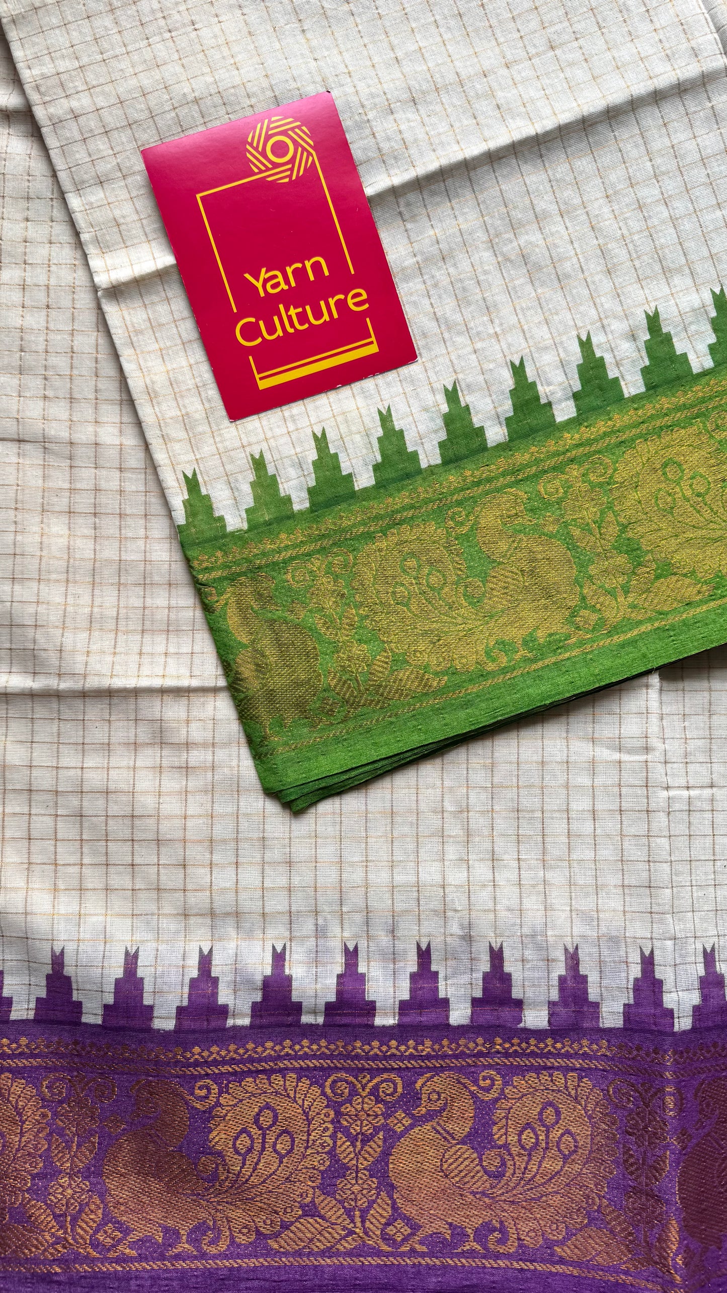 Apurva : Sungudi cotton checks, ivory gold base, green and purple dual tone border, soft cotton - YCONCOTN205
