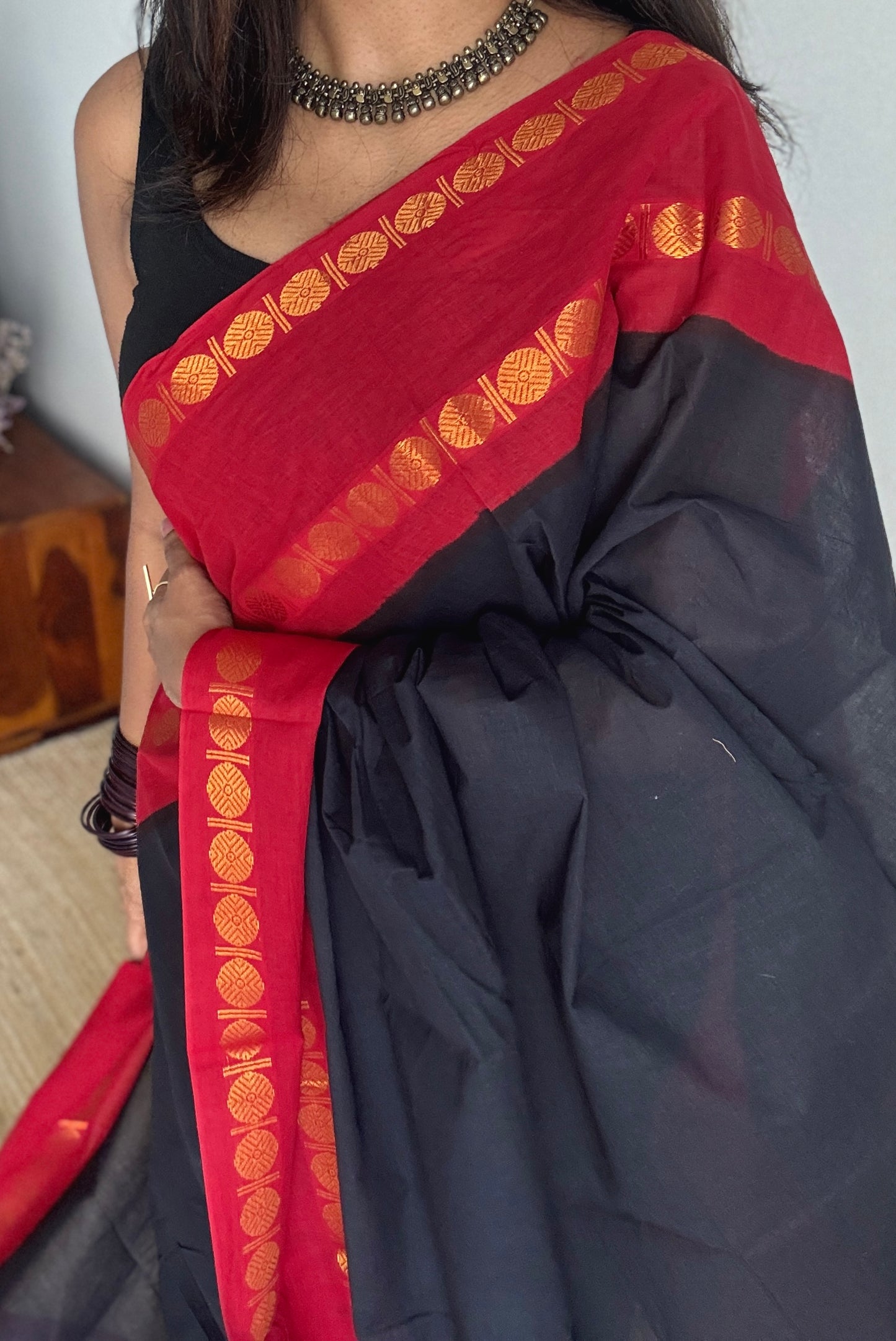 Black with red rudraksham motif border - Madurai Sungudi cotton