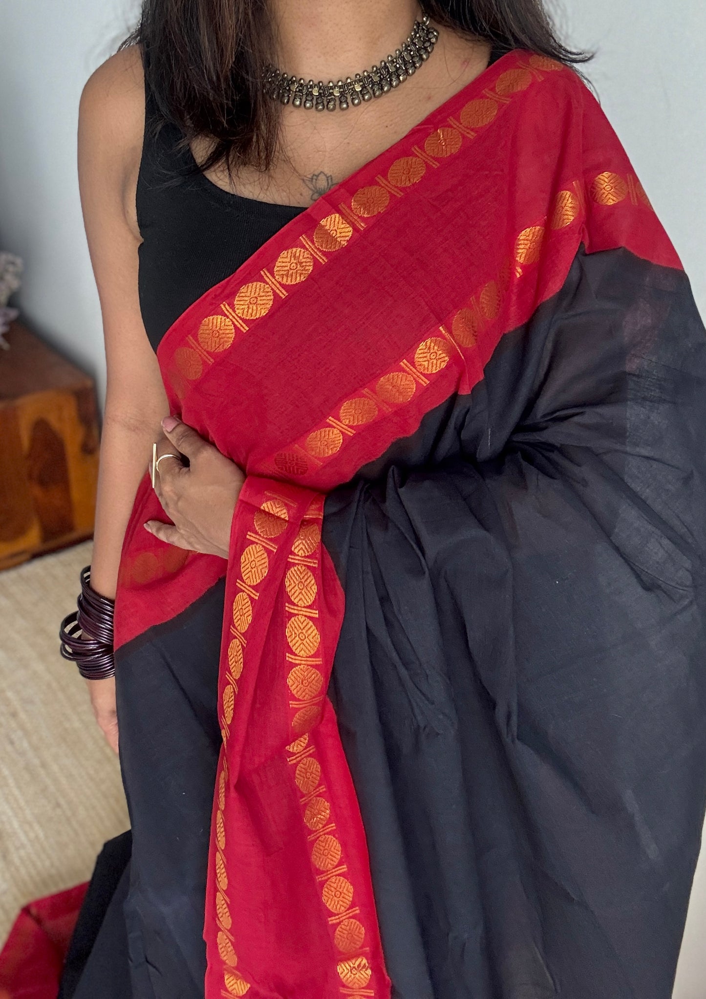 Black with red rudraksham motif border - Madurai Sungudi cotton