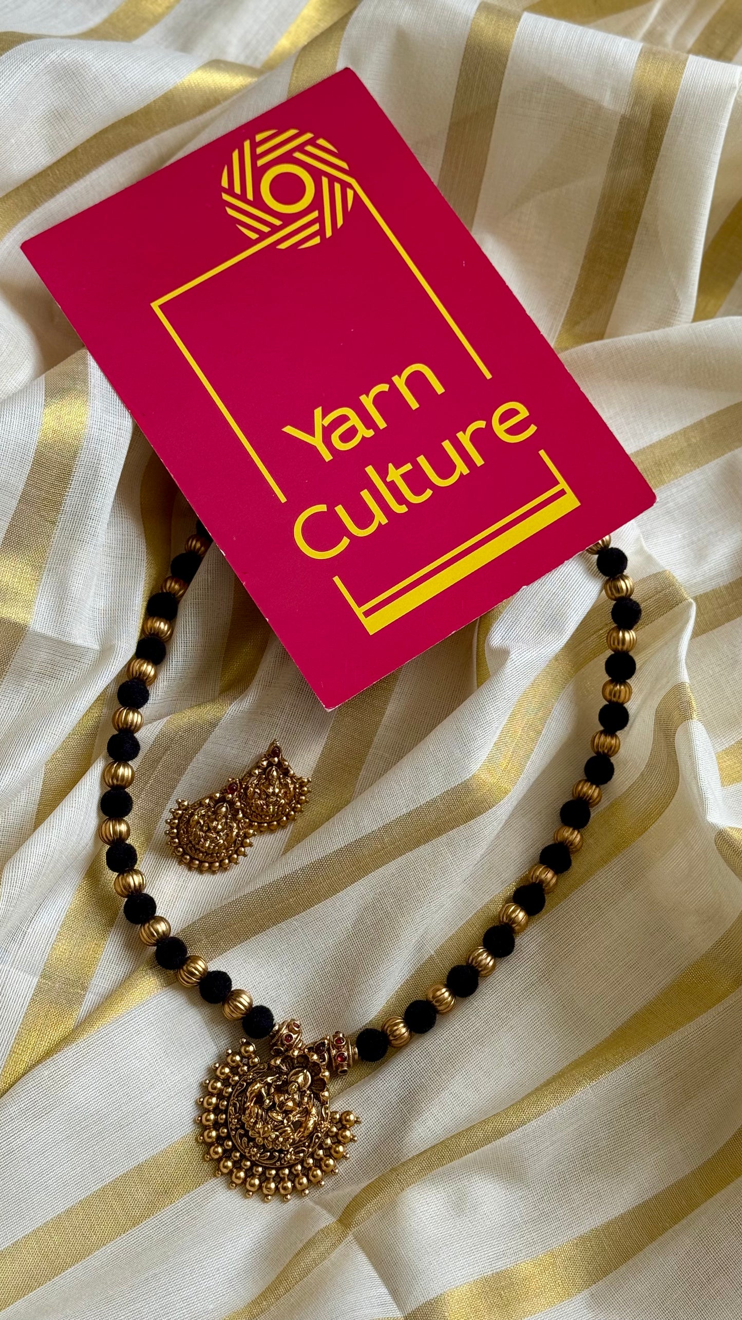 Black with gold beads, temple pendant in antique gold finish - YCAGC06
